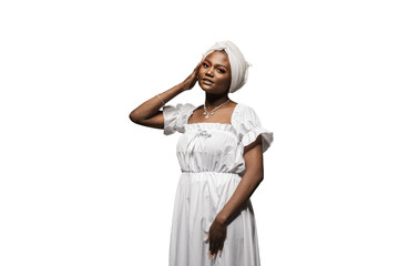 Beauty portrait of black attractive muslim model on white background. Relaxing and meditation.