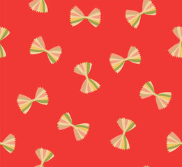Raw farfalle pasta isolated on red background pattern