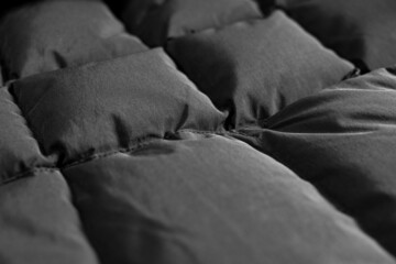 grey fabric texture of winter jacket, abstraction