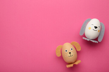 Easter eggs cute bunny and dog on pink background. Funny decoration. Happy Easter