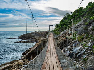 Fototapeta premium The suspension bridge of storm river mouth in the Tsitsikamma national park Garden route
