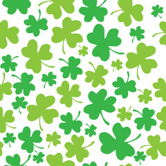 Seamless pattern with green lucky shamrock or clover leaves for St Patricks Day