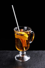 Alcoholic drinks at the bar. Bartender's hands in the process of making drinks.