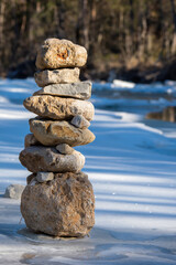Inuksuk rock formation on Ice marking hiking trail