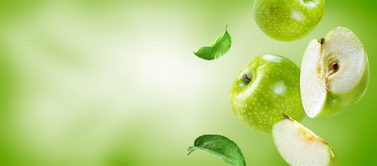 ripe apples group, slices and leaves surfing on air.Background for packaging and label design