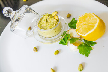 olive pistachio paste lemon glass