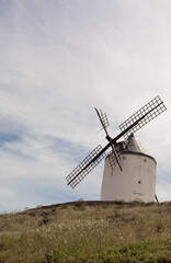 Fototapeta na wymiar White Windmill , one of the giants in Don Quijote Story