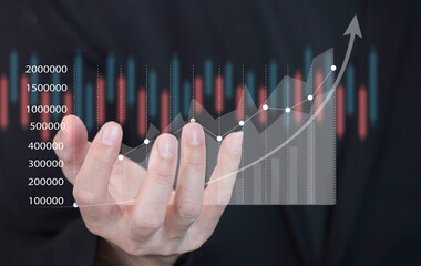 Stock market planning and strategy, business growth, progress or success concept A businessman or businessman is looking for a virtual stock investment Sales data and economic growth chart analysis