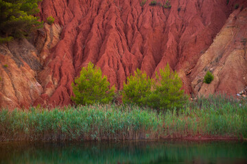 Colorful bauxite quarry lake in Apulia, Italy