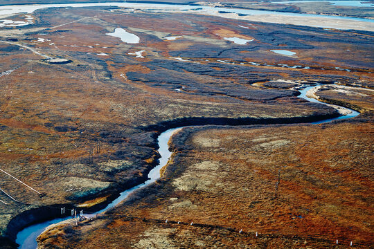 Summer nature landscape from above. Mountain range aerial view. river bank in the morning in the tundra. Taimyr Peninsula, Russia. Norilsk