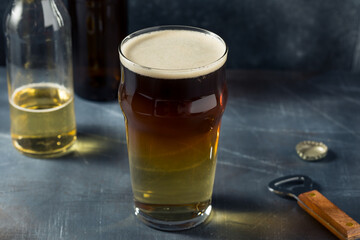 Cold Refreshing Snakebite Cider and Stout Cocktail
