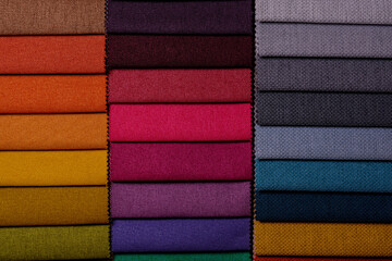 Samples of furniture fabrics.Multicolor fabric texture background.
