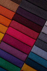 Samples of furniture fabrics.Multicolor fabric texture background.