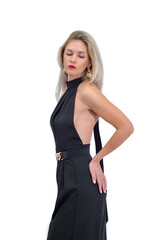 Fototapeta premium Portrait of an elegant woman with blond hair. Blonde girl in elegant black dress on white background.