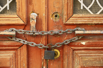 old door has decrepit paint in Portimao, Algarve, Portugal