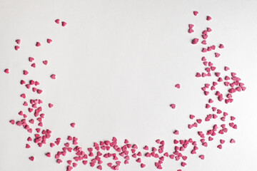 Fototapeta na wymiar Pink candy hearts on white background