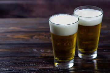 beer in a glass on a dark background