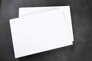 Blank flyer poster  a4 or a5 paper isolated on black, place for your mock-up design