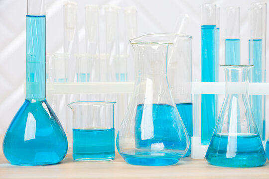 Laboratory glassware with test tubes. flasks, dropper, petri dishes, measuring cups and cylinders for scientific laboratories,