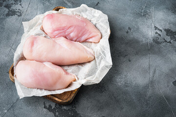 Chicken breast on grey background  with copy space
