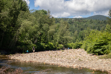 lake on beautiful summer day; rocky, mountains
