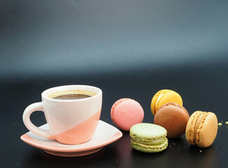 Cup of coffee and macaroons