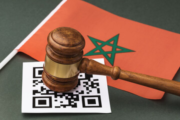 Judicial gavel, barcode sheet and Moroccan flag, the concept of administrative punishment for...