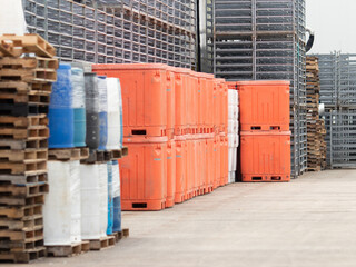 orange white and blue large containers