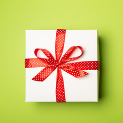 Gift box on color background