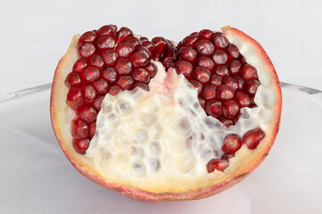 Closeup of a half cut pomegranate