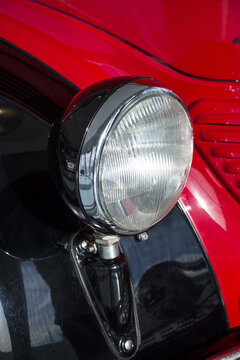 Retro Red Car Headlight Close Up