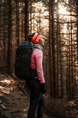 Obraz na płótnie Canvas Traveler hiking with backpacks. Hiking in mountains. Sunny landscape. Tourist traveler on background view mockup. High tatras , slovakia