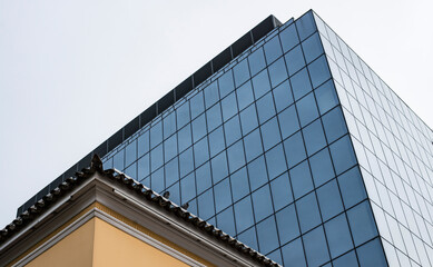 Obraz premium Two different worlds in our cities. Old and new.