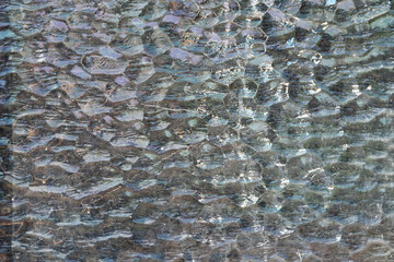 Cracked and abstract glass texture. Transparent material backdrop. Glass effect pattern. Mirror and glass background.