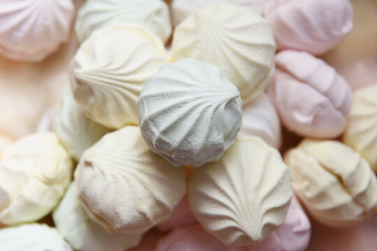 Multicolored air marshmallow according to a classic recipe at a confectionery factory, lies for sale to customers