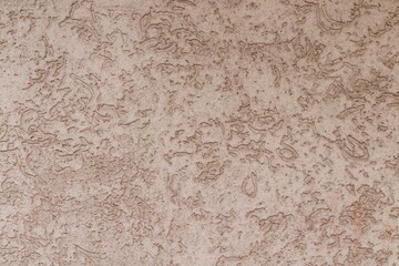 texture pale pink uneven plastered wall 