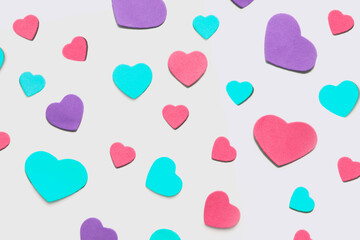 Valentine's Day background. Isolated multi-colored hearts on a white background.
