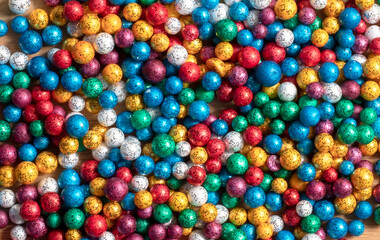 Fototapeta na wymiar Multi-colored small size of thermocol decorative balls, Closeup