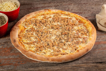 Tuna pizza with mozzarella and tomato sauce, Brazilian pizza.