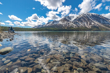 Pristine clear water lake in northern Canada with picturesque view. Stunning tourism, travel shot...