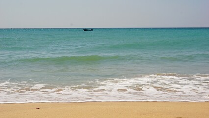 Beautiful seashore with catamaran boat