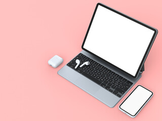 Aluminum laptop with mobile phone headphones on pink background