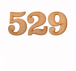 Number 529 - Piece of wood isolated on white background
