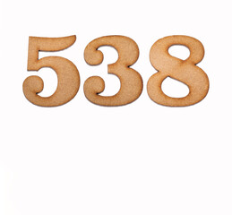Number 538 in wood, isolated on white background