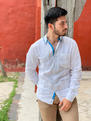 Model wearing an elegant white guayabera