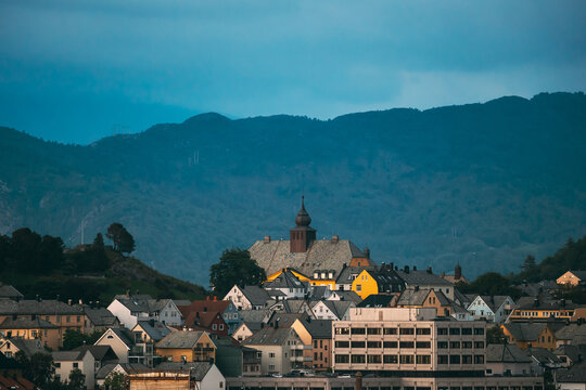 Alesund, Norway. Alesund Skyline Cityscape. Historical Center In Summer Evening. Old Aspoy School. Aspoya Island. Alesund, Norway. Alesund Skyline Cityscape. Historical Center In Summer Evening. Old