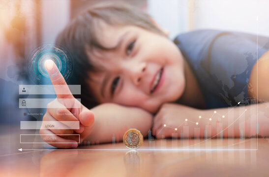 Kid Boy using Fingerprint Login on Internet for Data Information Networking,Global currency exchange and banking,Double exposure growth futuristic chart money investment data,Concept for Stock market