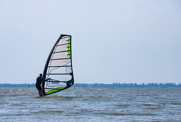 Windsurfing. Entertainment at sea, extreme sports, lifestyle during the summer holidays