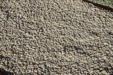 small bright pebbles and gravel as background or texture