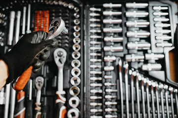 ratchet tool wrench for loosening bolts in a set.